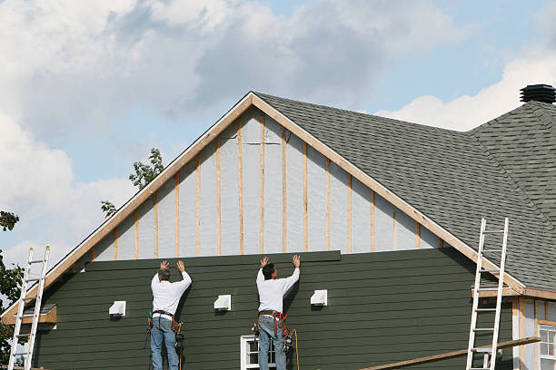 Professional Siding Installation technician working in Belmont, OH